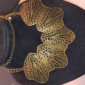 mark. Intricate Gold Leaf Necklace